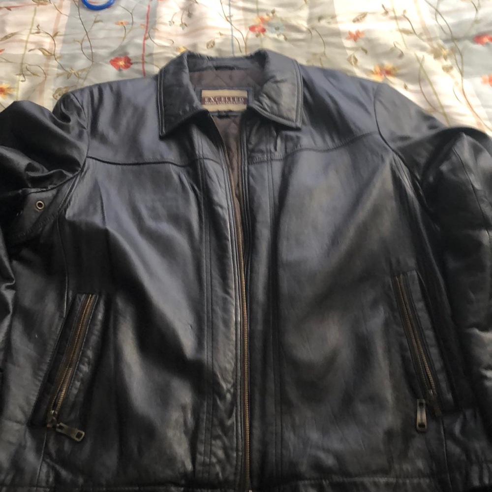 Brown leather large Excelled Men’s Collection coat.